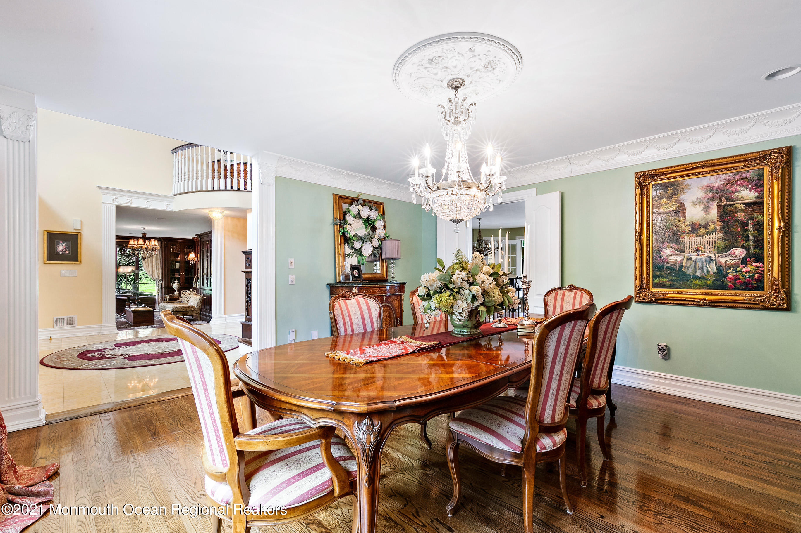 5 Post Road Rumson, NJ 07760 - Photo 22 of 67 a view of a dining room with furniture wooden floor and chandelier