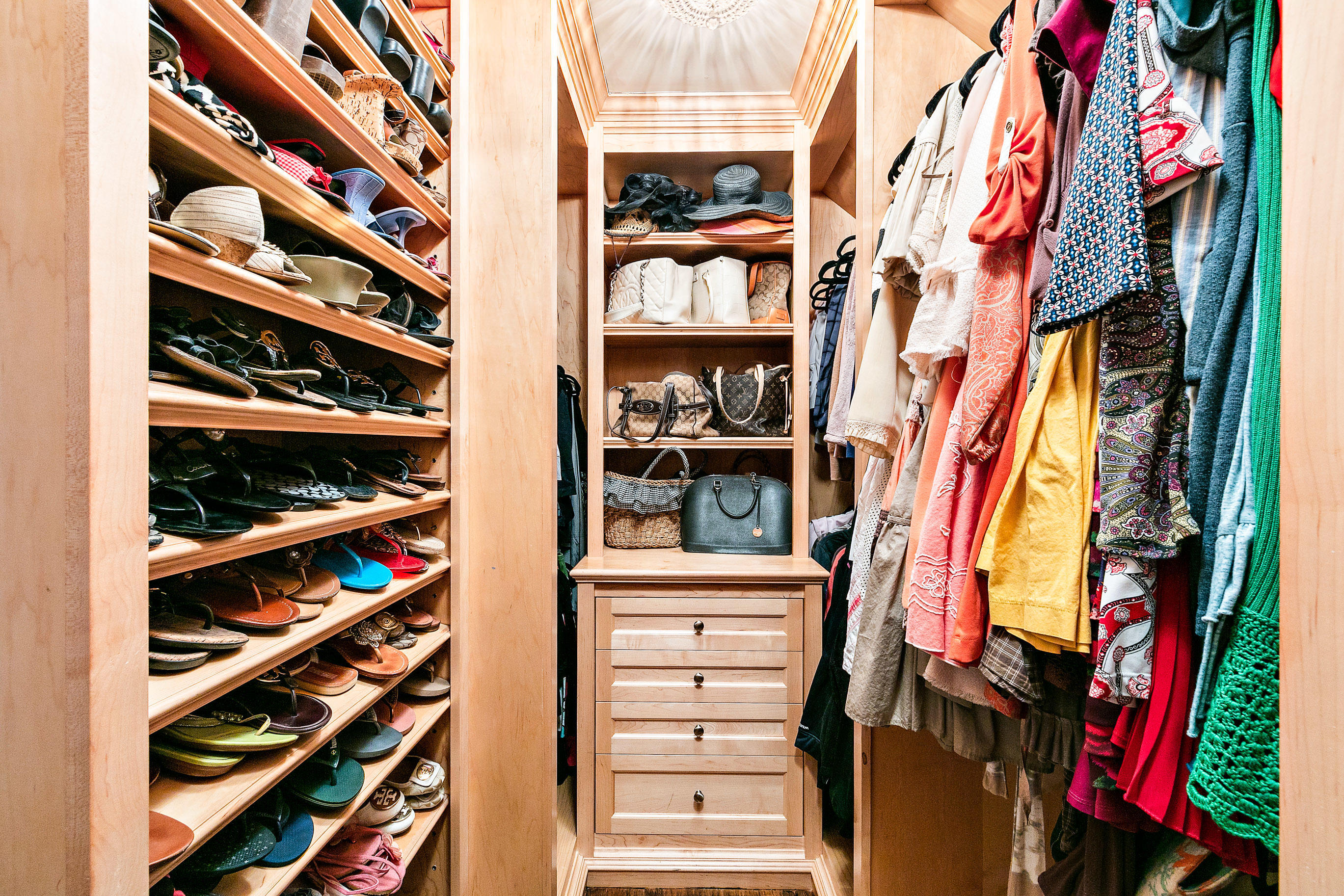 5 Post Road Rumson, NJ 07760 - Photo 30 of 67 a view of walk in closet with clothes and shoes