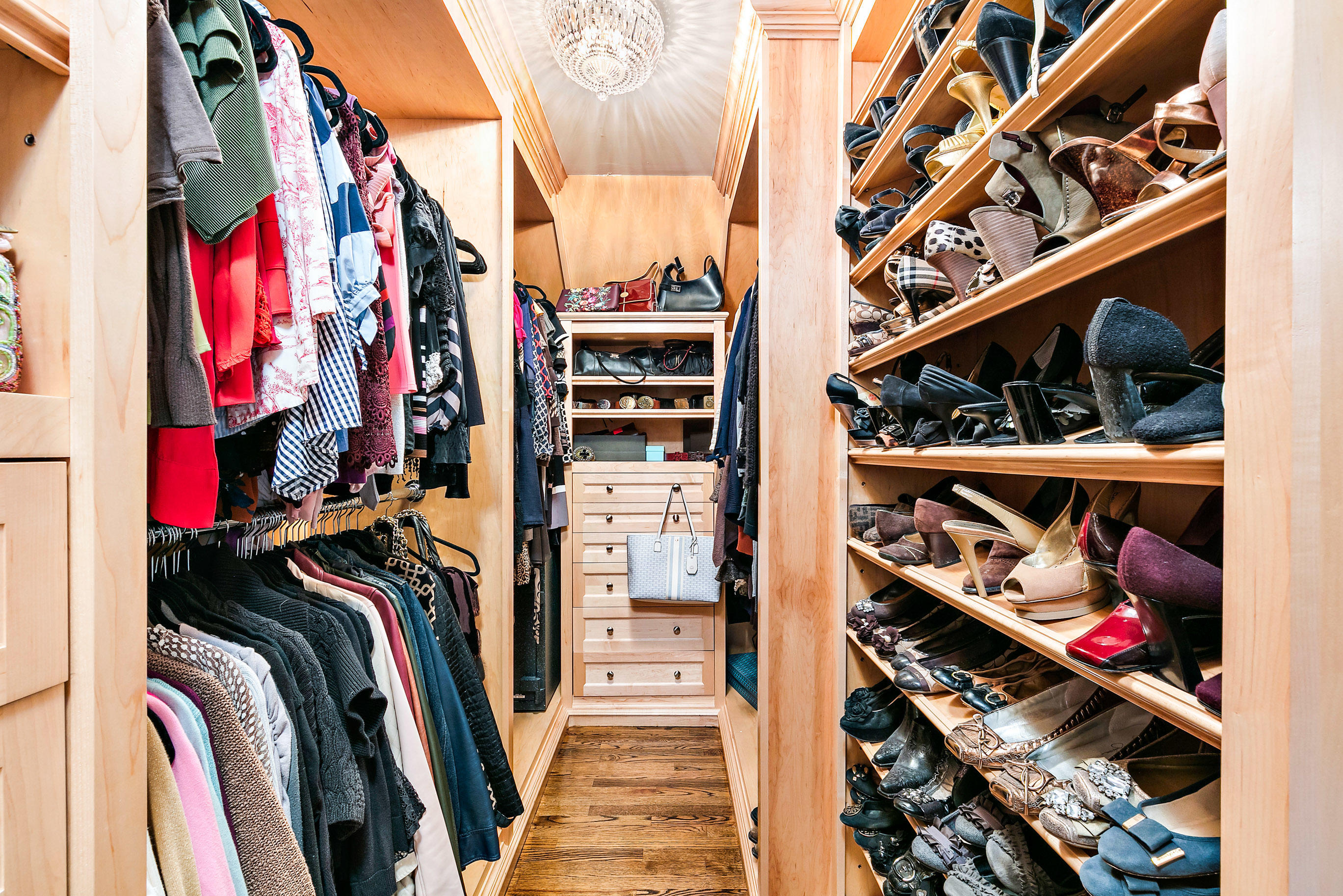 5 Post Road Rumson, NJ 07760 - Photo 31 of 67 a view of walk in closet with clothes and shoes