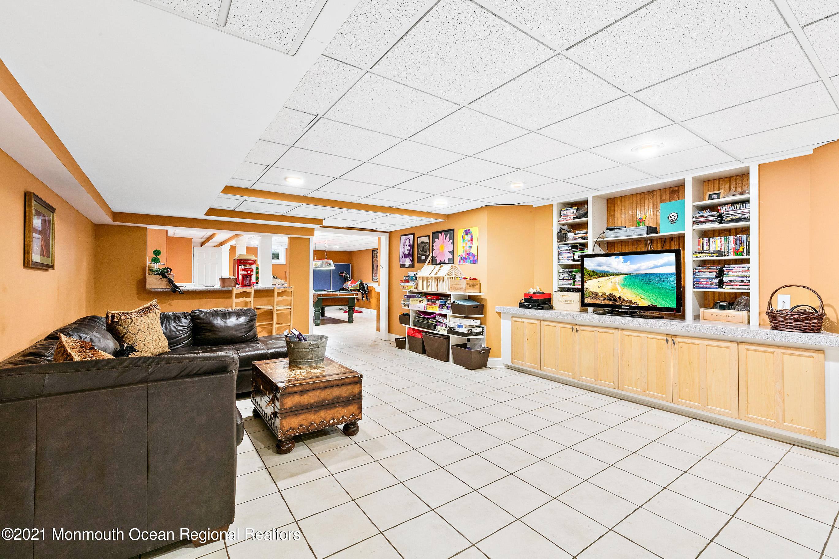 5 Post Road Rumson, NJ 07760 - Photo 43 of 67 a living room with furniture and a flat screen tv