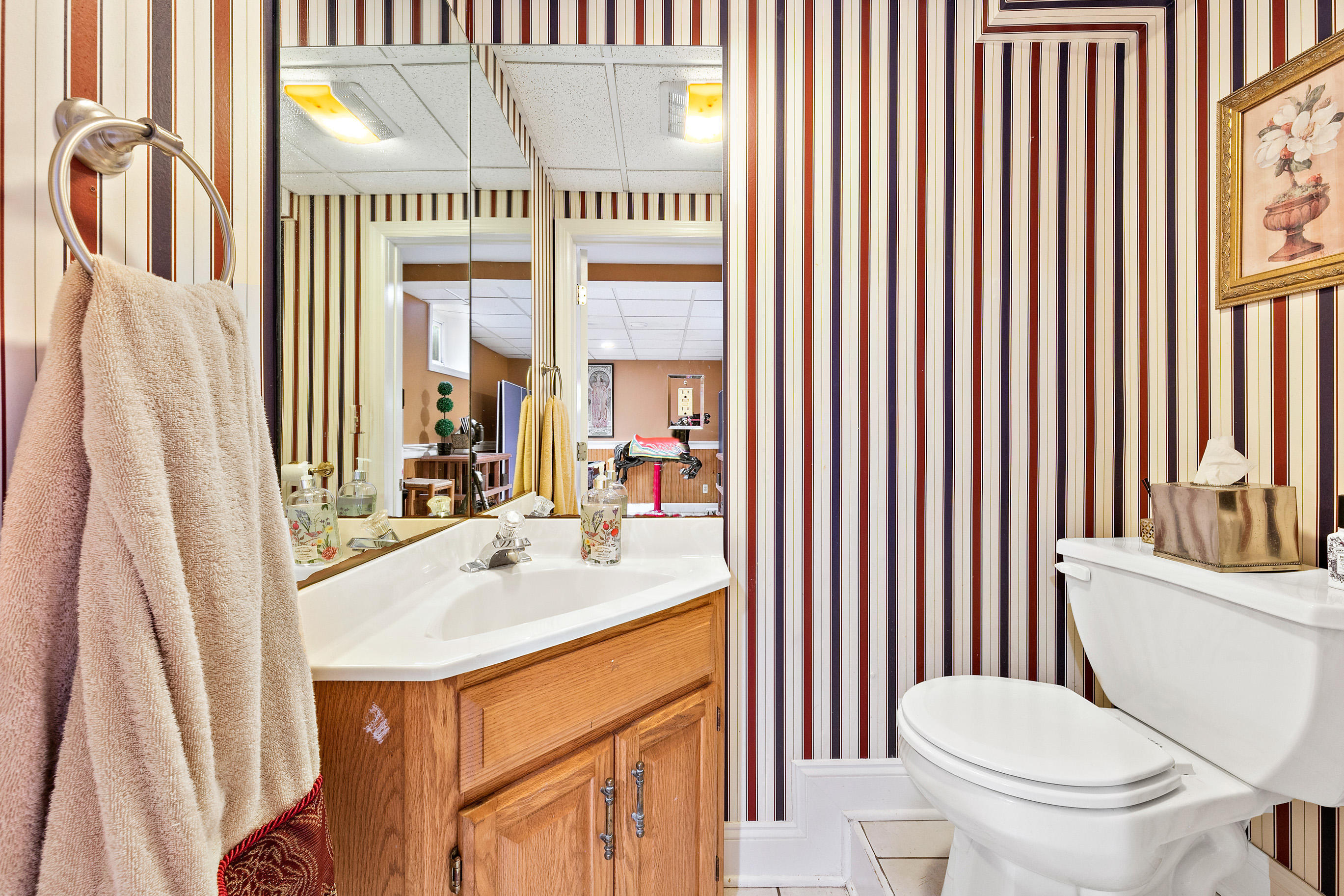 5 Post Road Rumson, NJ 07760 - Photo 48 of 67 a bathroom with a sink a toilet and mirror