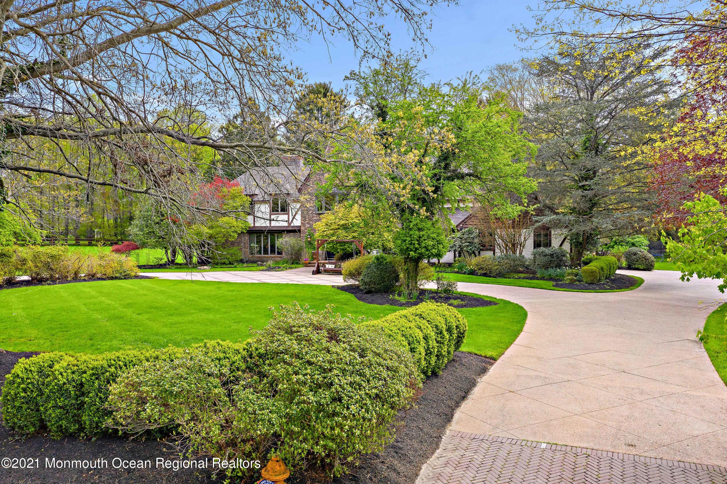 5 Post Road Rumson, NJ 07760 - Photo 64 of 67 a view of a fountain in front of a house