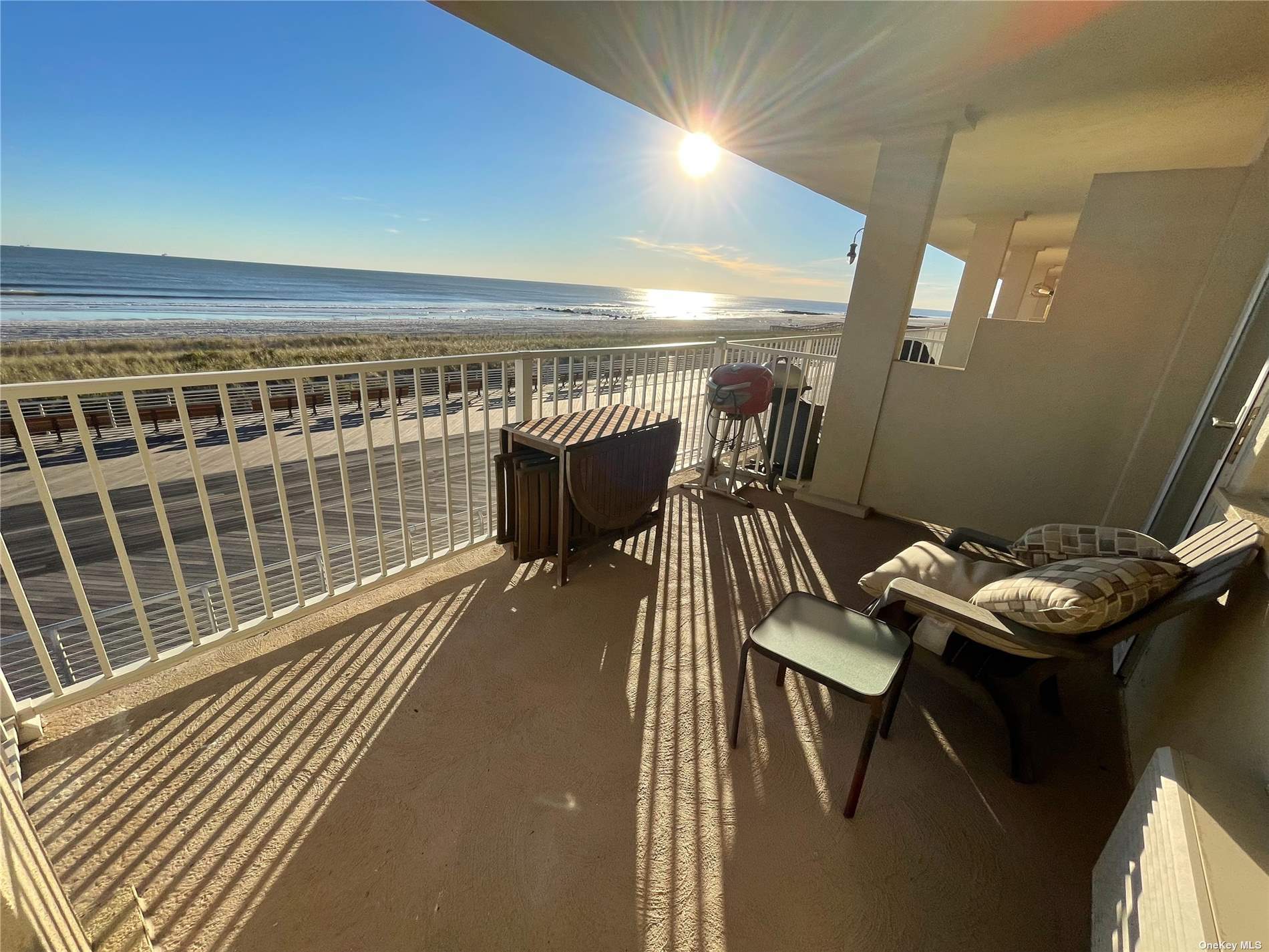 250 Shore Road, Unit 2A Long Beach, NY 11561 - Photo 1 of 1 a view of a balcony with chairs