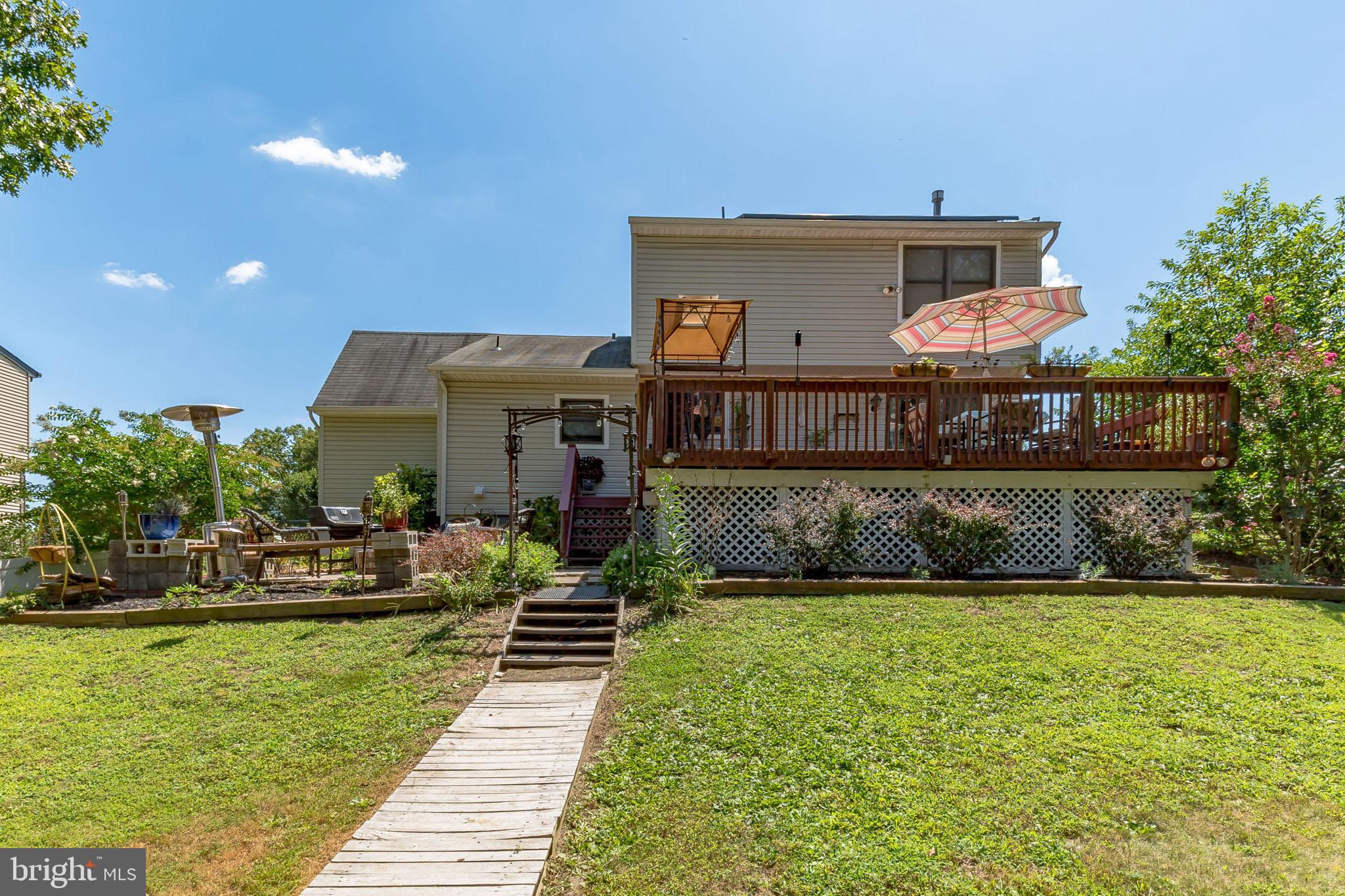 5 Sunset Drive Clementon, NJ 08021 - Photo 16 of 21 The 'boardwalk' from the pond to the patio