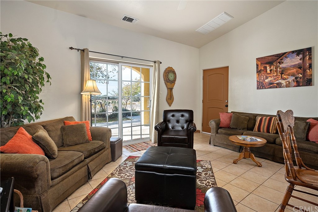 4295 Union Road Paso Robles, CA 93446 - Photo 16 of 39 a living room with furniture and a floor to ceiling window