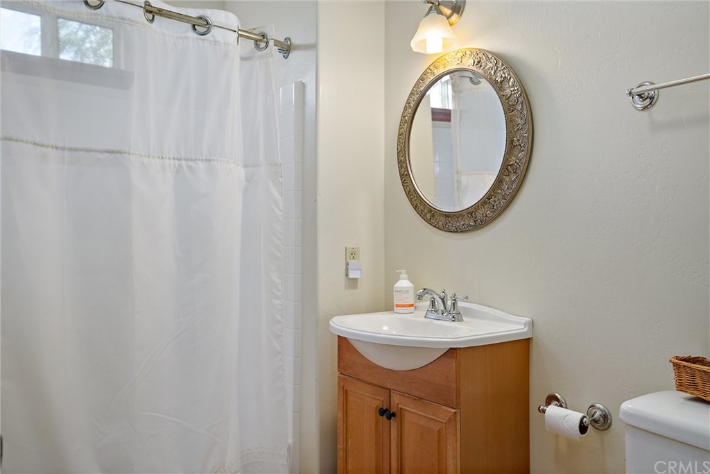4295 Union Road Paso Robles, CA 93446 - Photo 22 of 39 a bathroom with a sink and a mirror
