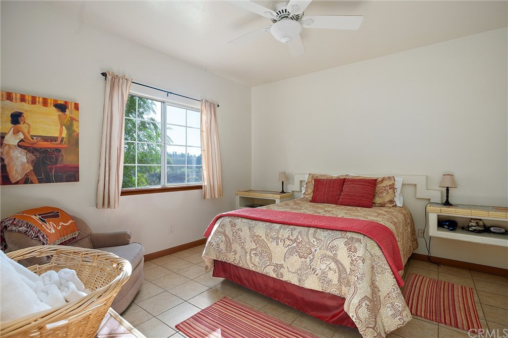 4295 Union Road Paso Robles, CA 93446 - Photo 23 of 39 a bedroom with a bed and a couch