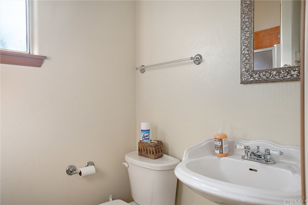 4295 Union Road Paso Robles, CA 93446 - Photo 24 of 39 a bathroom with a sink mirror and toilet