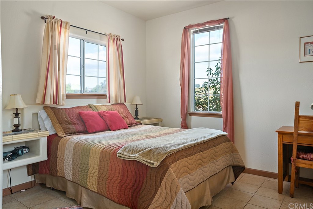 4295 Union Road Paso Robles, CA 93446 - Photo 25 of 39 a bedroom with a bed and a window