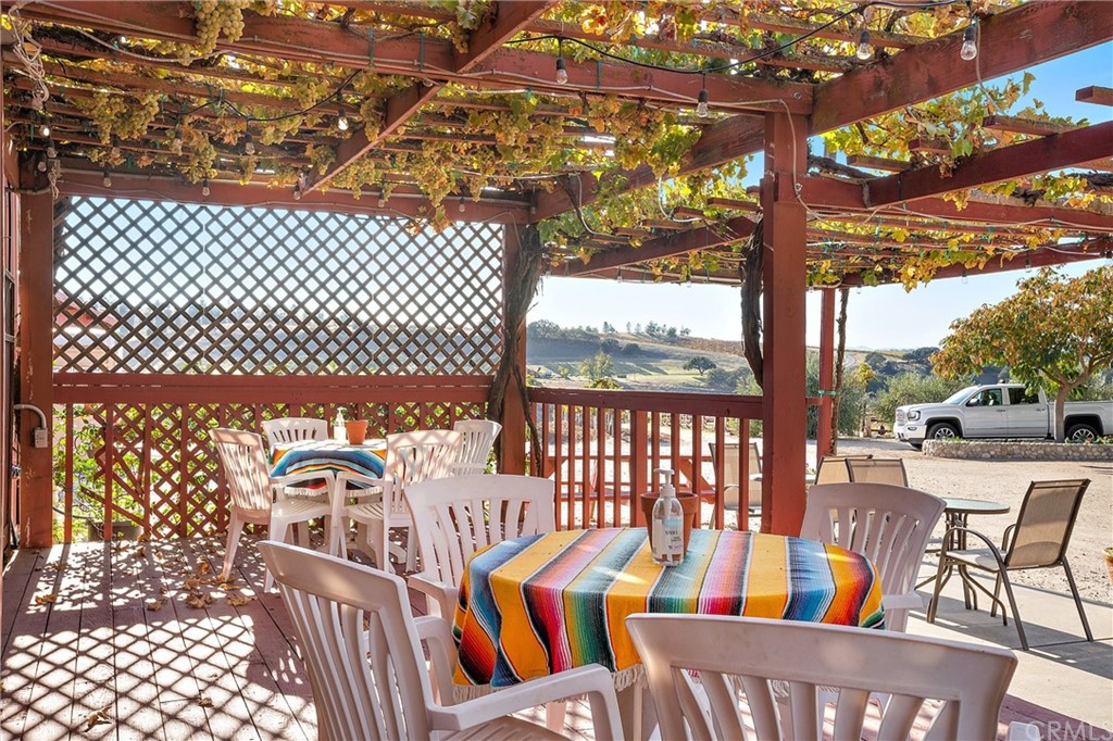 4295 Union Road Paso Robles, CA 93446 - Photo 9 of 39 a view of a chairs and table in the patio