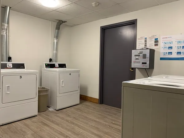 a room with dryer and washer