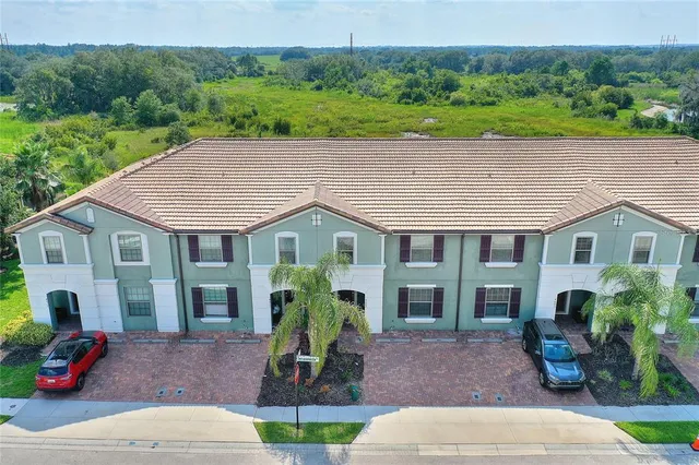 a aerial view of a house with garden