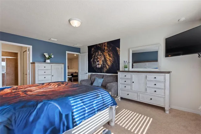 a bed room with a bed and a couch