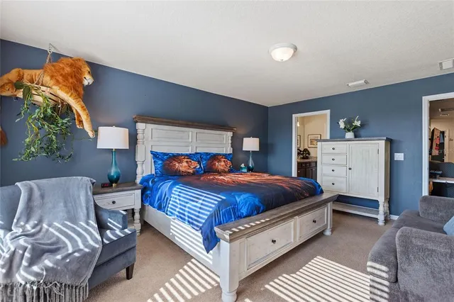 a bed room with a bed and a couch