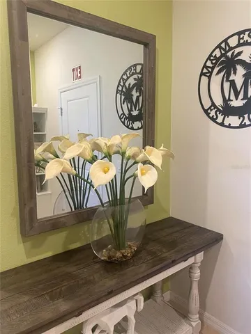 a view of a dining room with wooden floor