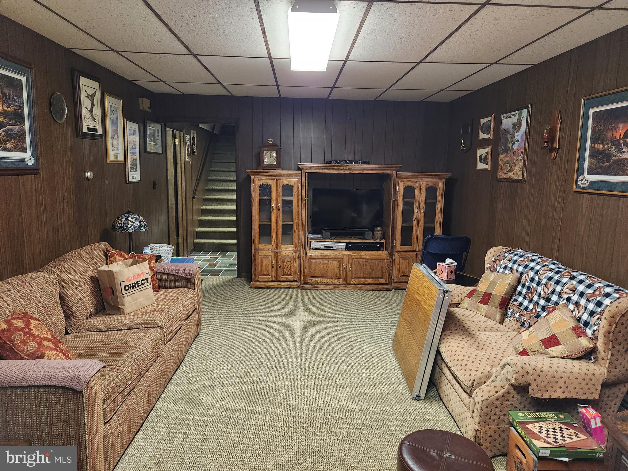 208 Oberholtzer Road Elizabethtown, PA 17022 - Photo 27 of 34 a living room with furniture and a flat screen tv