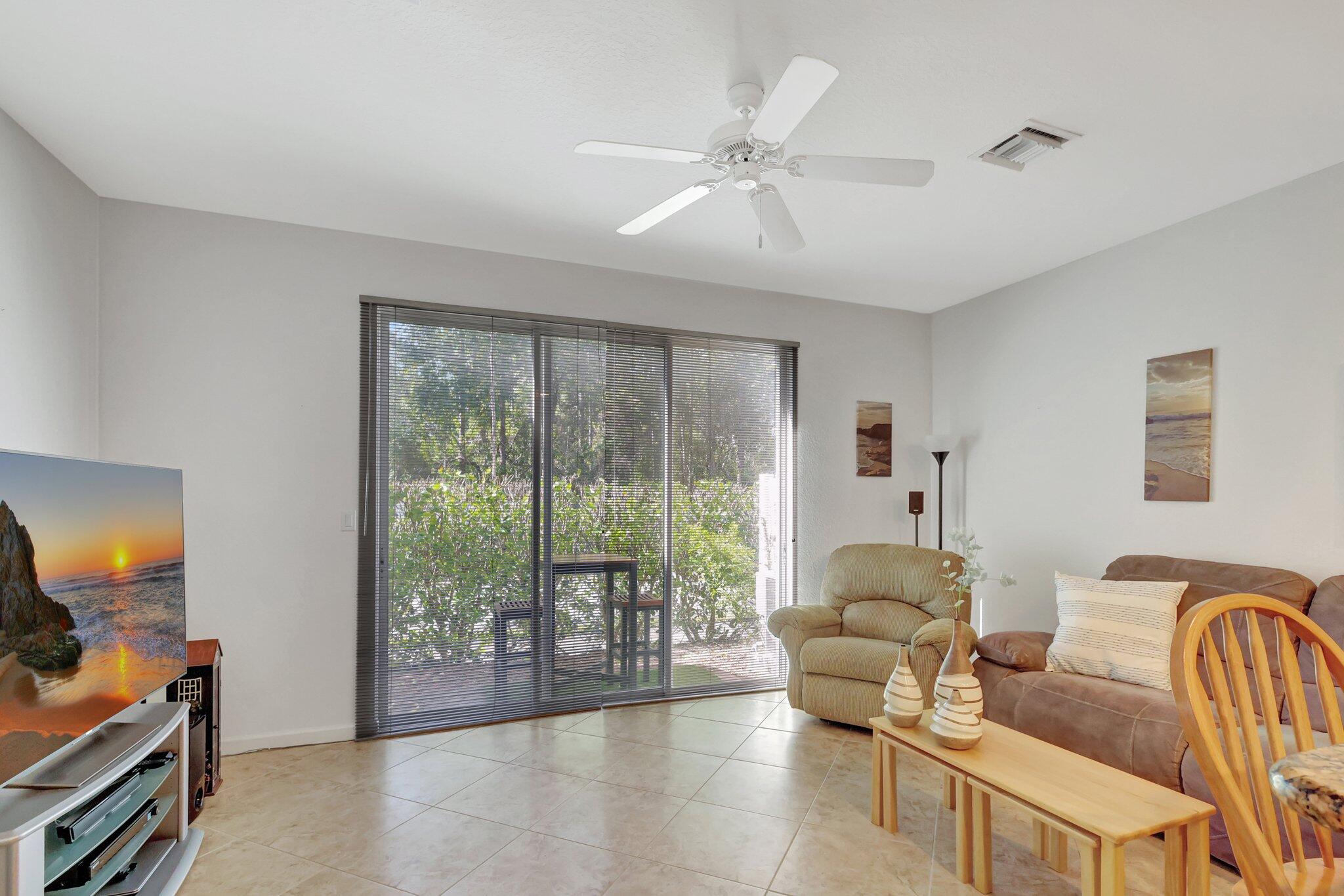 9474 Southwest Purple Martin Way Stuart, FL 34997 - Photo 9 of 24 14-web-or-mls-5P1A9670
