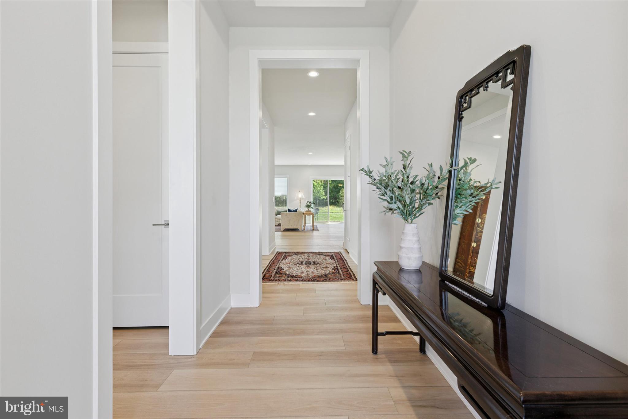 249 Rush Lane Ambler, PA 19002 - Photo 2 of 24 a living room with furniture and a potted plant