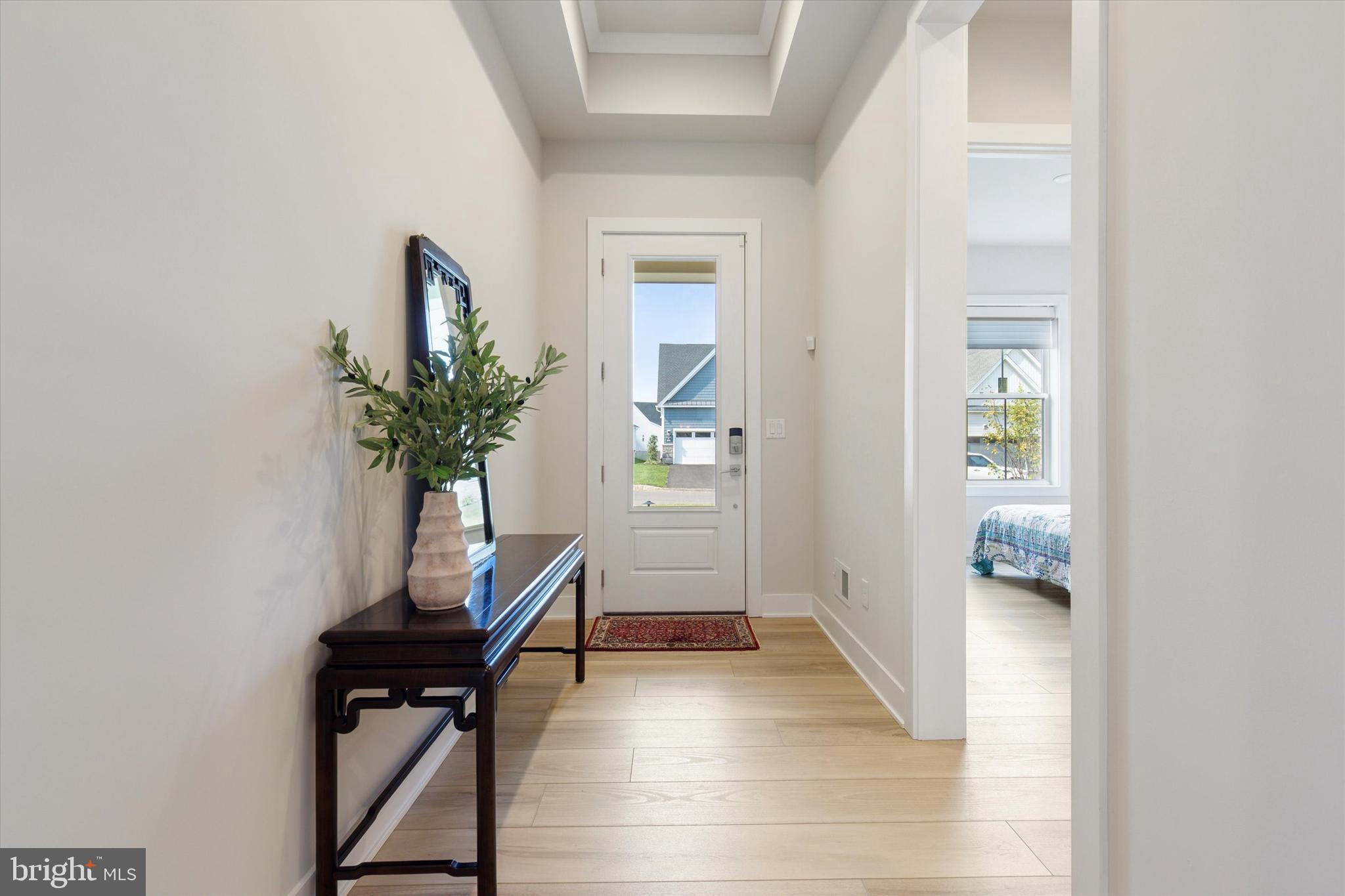 249 Rush Lane Ambler, PA 19002 - Photo 3 of 24 a living room with furniture and a potted plant