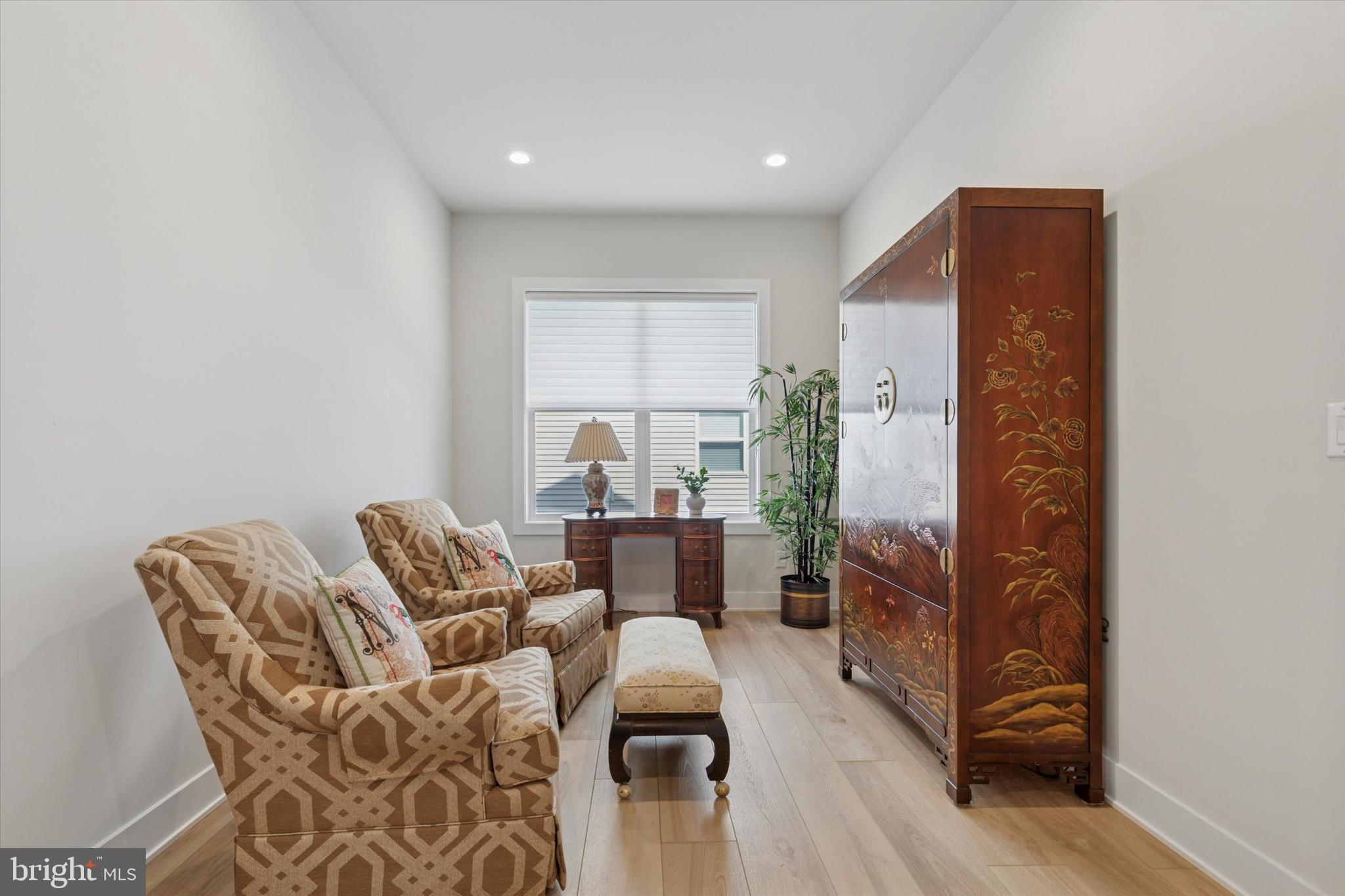 249 Rush Lane Ambler, PA 19002 - Photo 8 of 24 a living room with furniture and a wooden floor