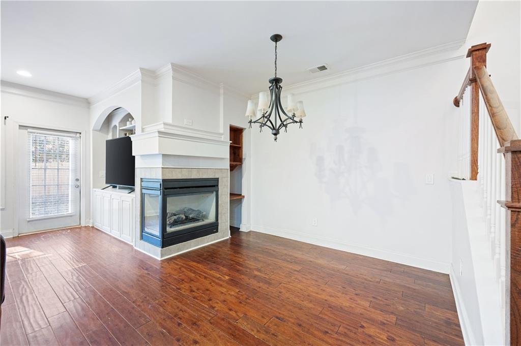 138 Trailside Way Hiram, GA 30141 - Photo 15 of 35 a view of a livingroom with wooden floor staircase and a hallway