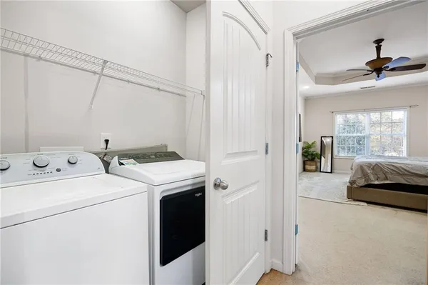 a utility room with dryer and washer