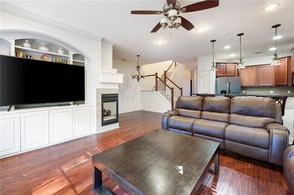 138 Trailside Way Hiram, GA 30141 - Photo 8 of 35 a living room with furniture and a flat screen tv