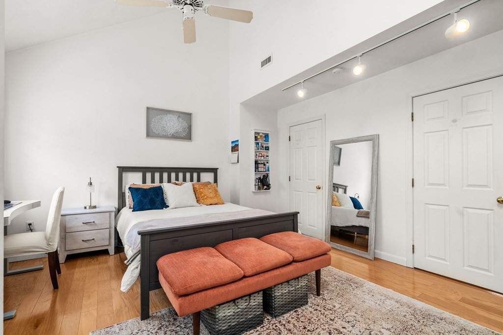53 South Walnut Street, Unit 2 Quincy, MA 02169 - Photo 13 of 24 a bedroom with furniture and a rug
