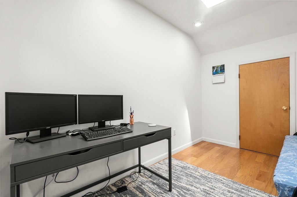 53 South Walnut Street, Unit 2 Quincy, MA 02169 - Photo 19 of 24 a view of a workspace with furniture