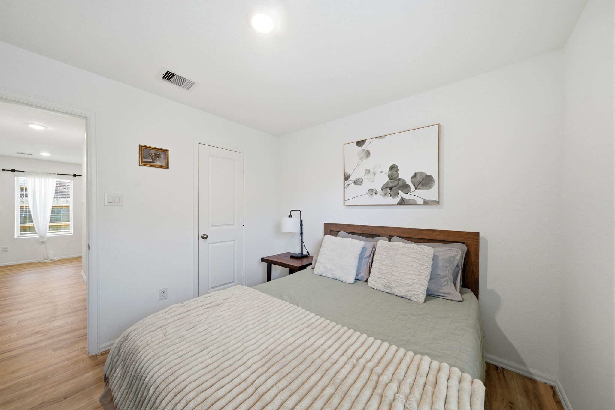 14502 Woodcott Warren Way Rosharon, TX 77583 - Photo 6 of 37 Secondary Bedroom 1—comfortably positioned at the front of the home, offering flexibility for guests, a home office, or everyday living.