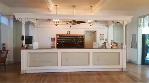 a view of kitchen with cabinets