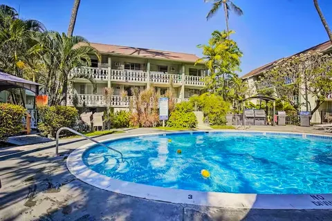 a view of a swimming pool with a patio