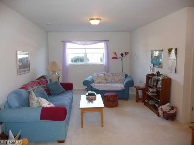 6907 Channel Forest Road Belews Creek, NC 27009 - Photo 6 of 14 Den/Family/Great Room. ANother view of the den