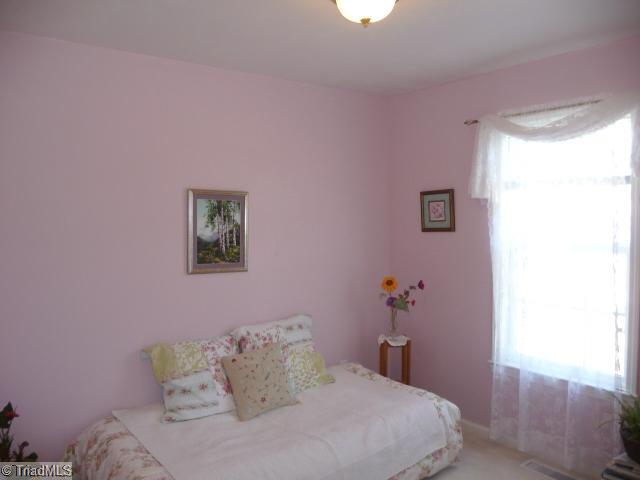 6907 Channel Forest Road Belews Creek, NC 27009 - Photo 10 of 14 3rd Bedroom. Perfect for the princess in the family! Spacious and bright!
