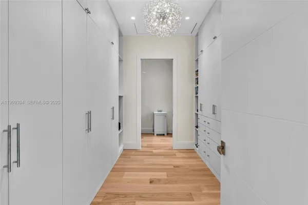 a view of a bathroom with a shower and sink