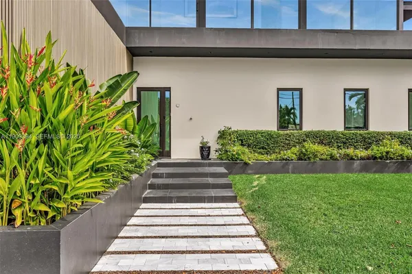 a view of a garden with a pathway