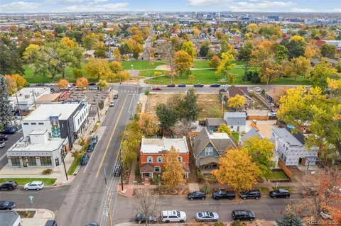 an aerial view of residential building and parking space