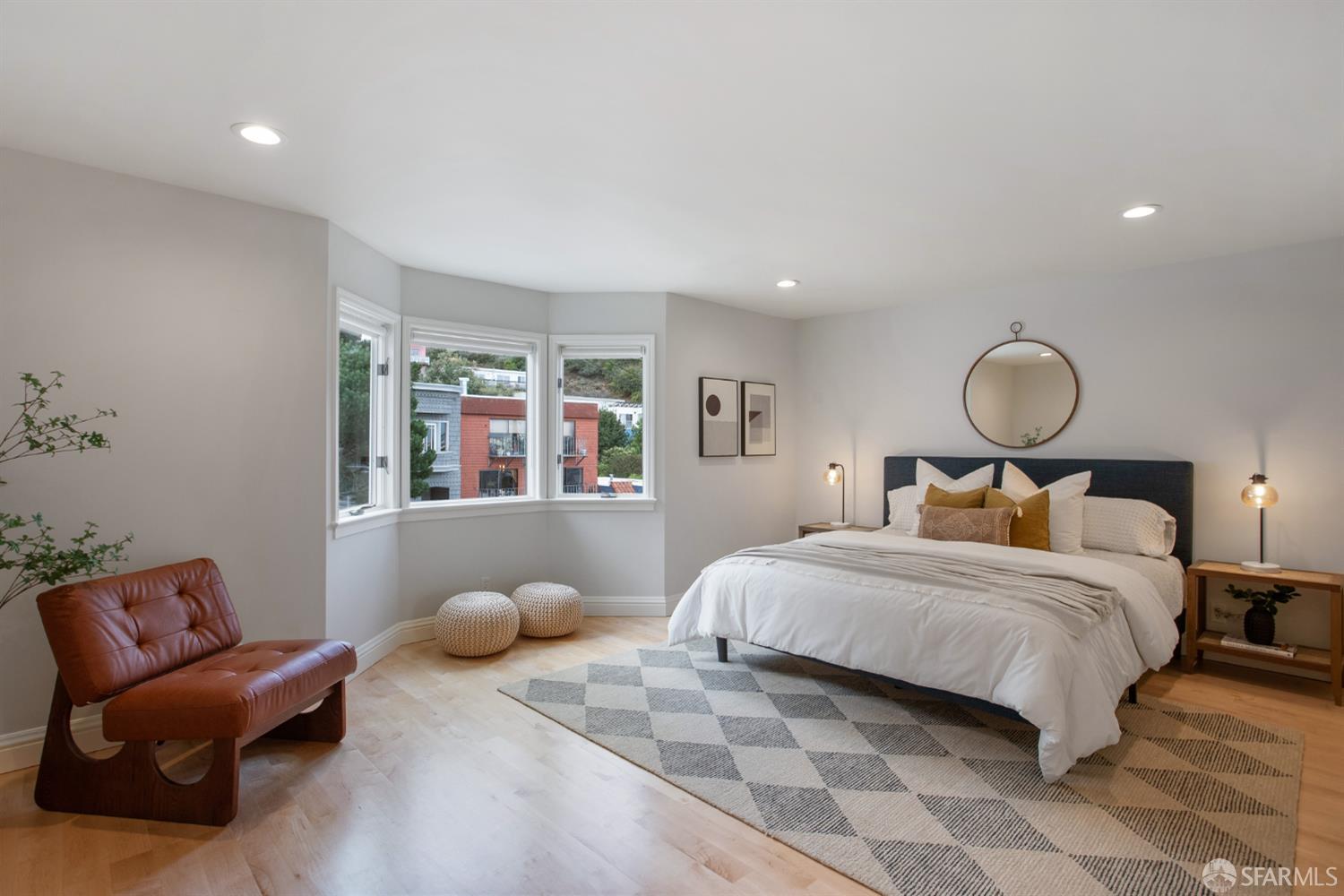 251 Ripley Street San Francisco, CA 94110 - Photo 13 of 39 a bedroom with a bed and window
