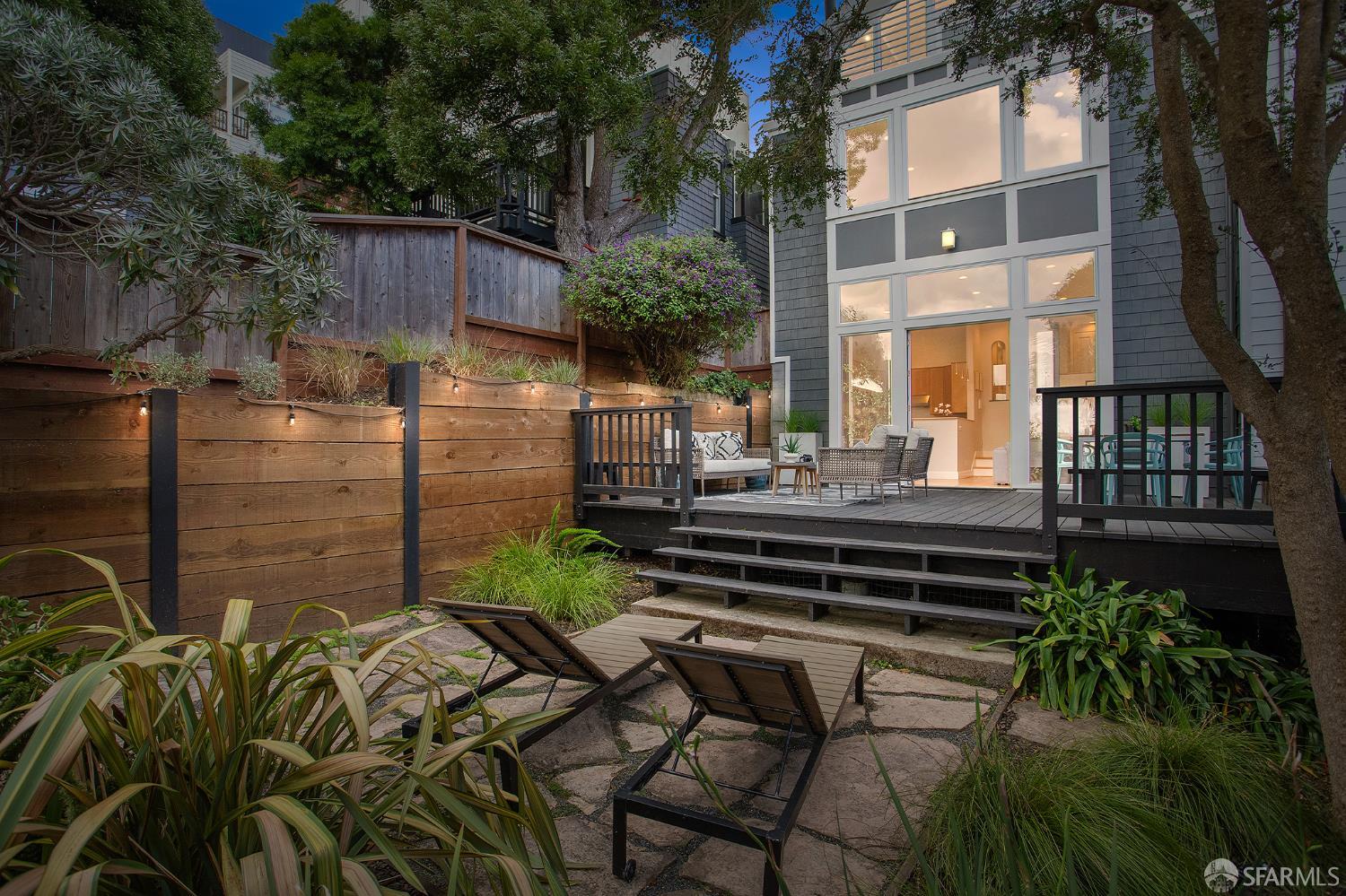 251 Ripley Street San Francisco, CA 94110 - Photo 2 of 39 a view of a backyard with sitting area