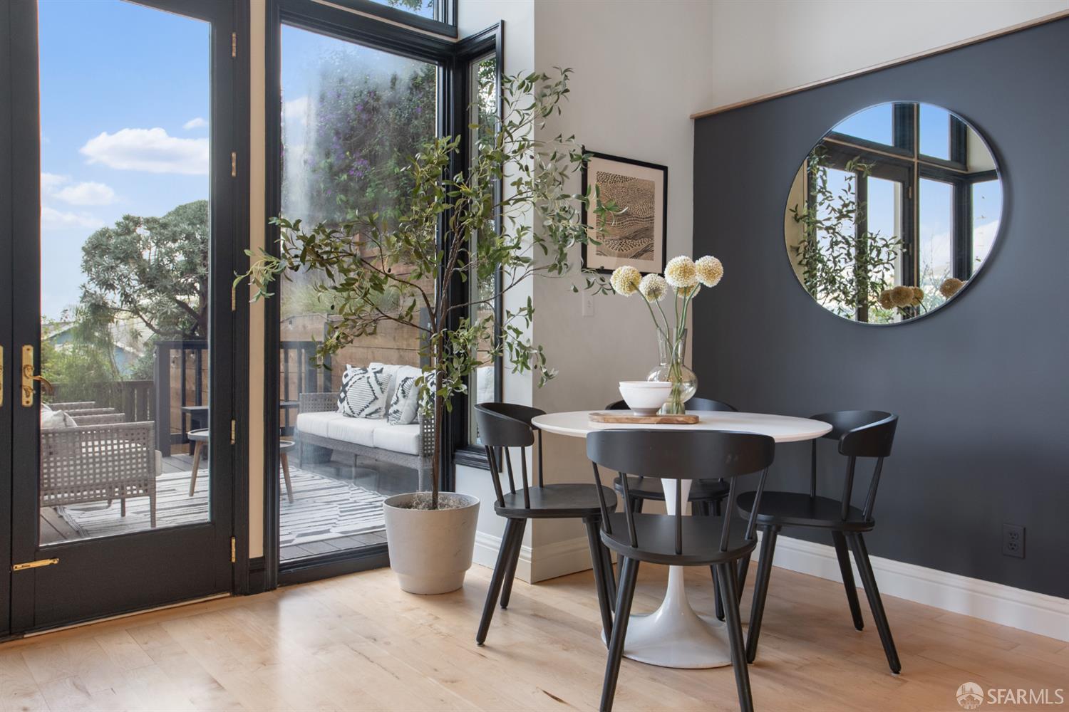 251 Ripley Street San Francisco, CA 94110 - Photo 21 of 39 a view of a dining room with furniture window and wooden floor