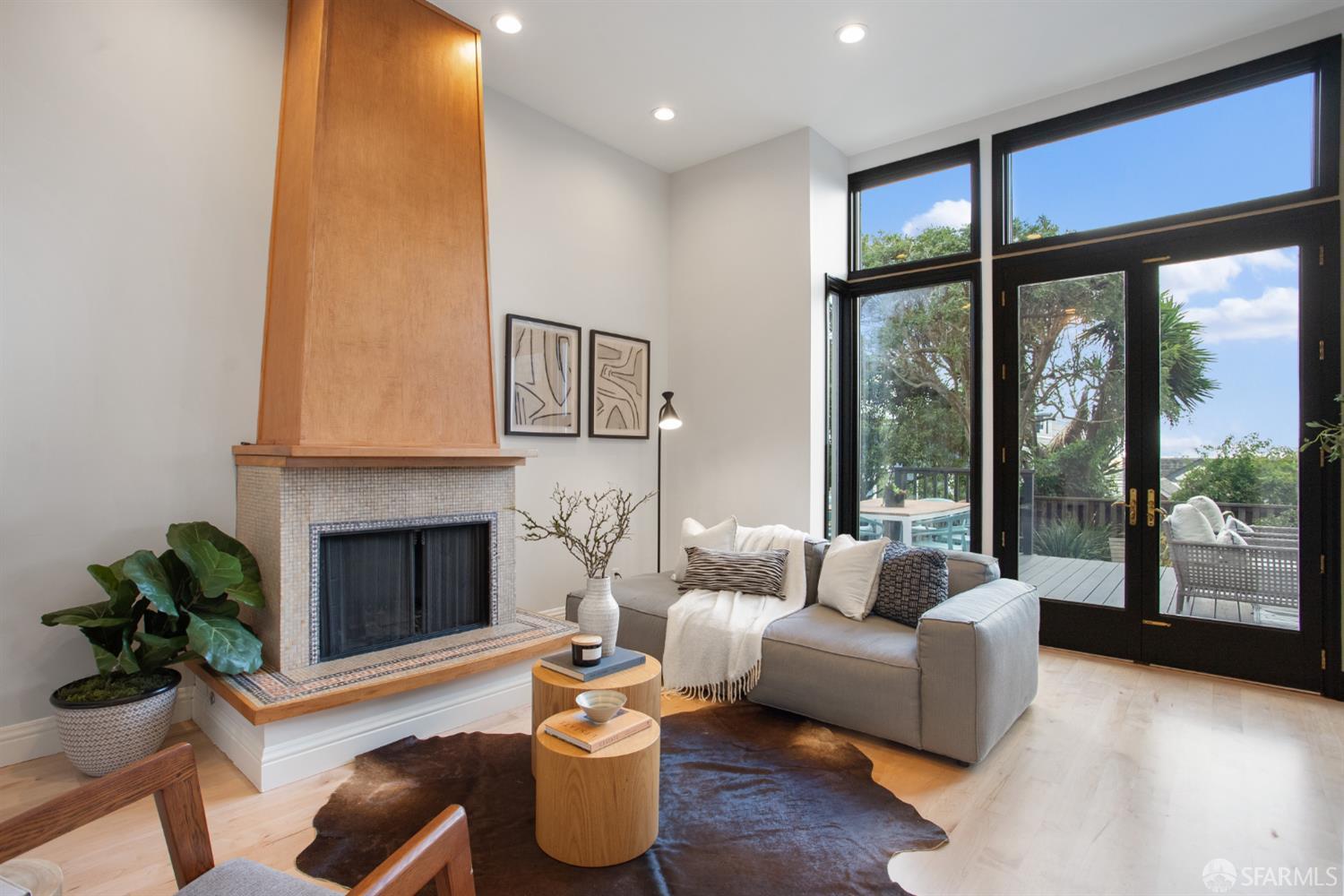 251 Ripley Street San Francisco, CA 94110 - Photo 24 of 39 a living room with furniture fireplace and a large window