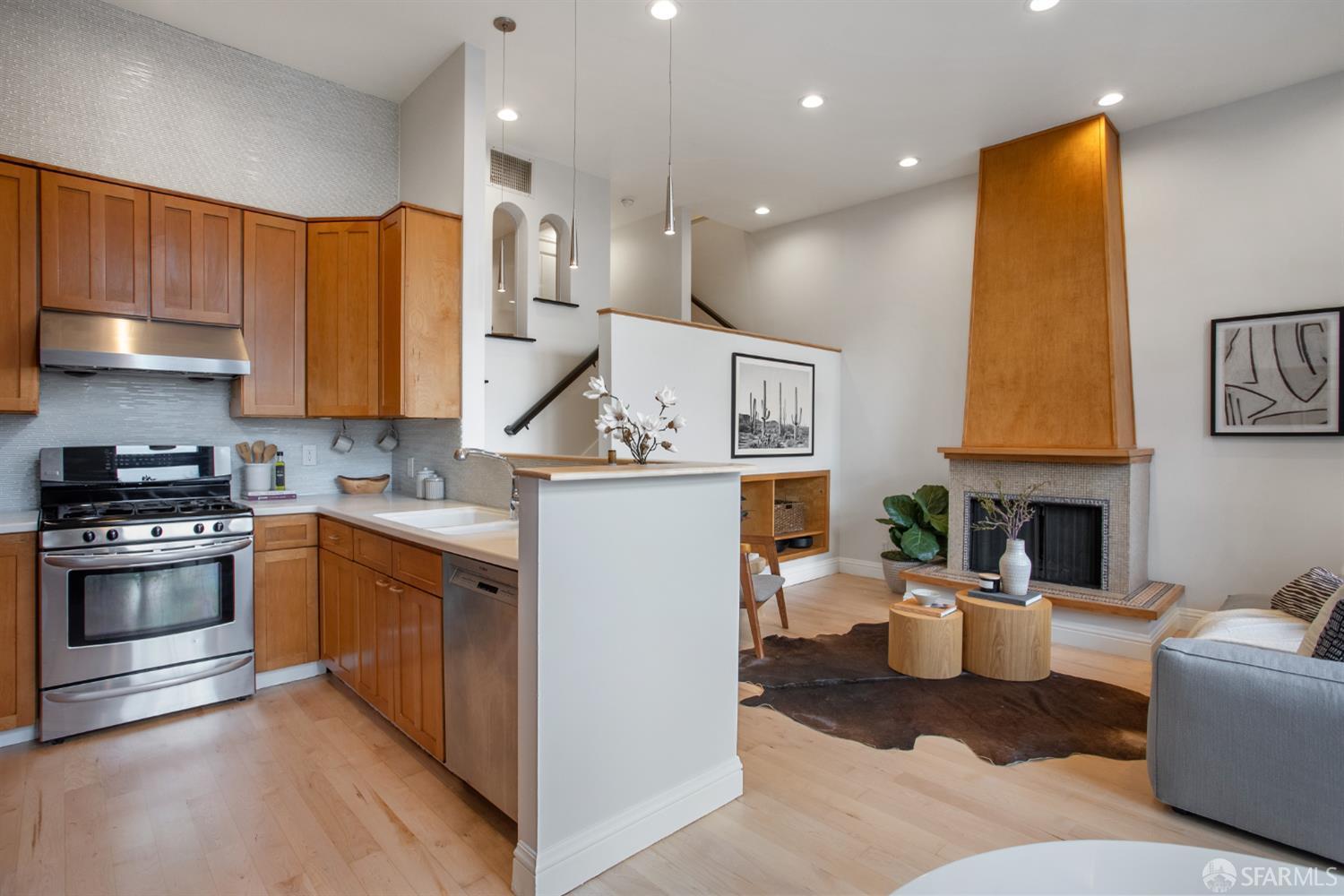 251 Ripley Street San Francisco, CA 94110 - Photo 28 of 39 a kitchen with a sink appliances and cabinets