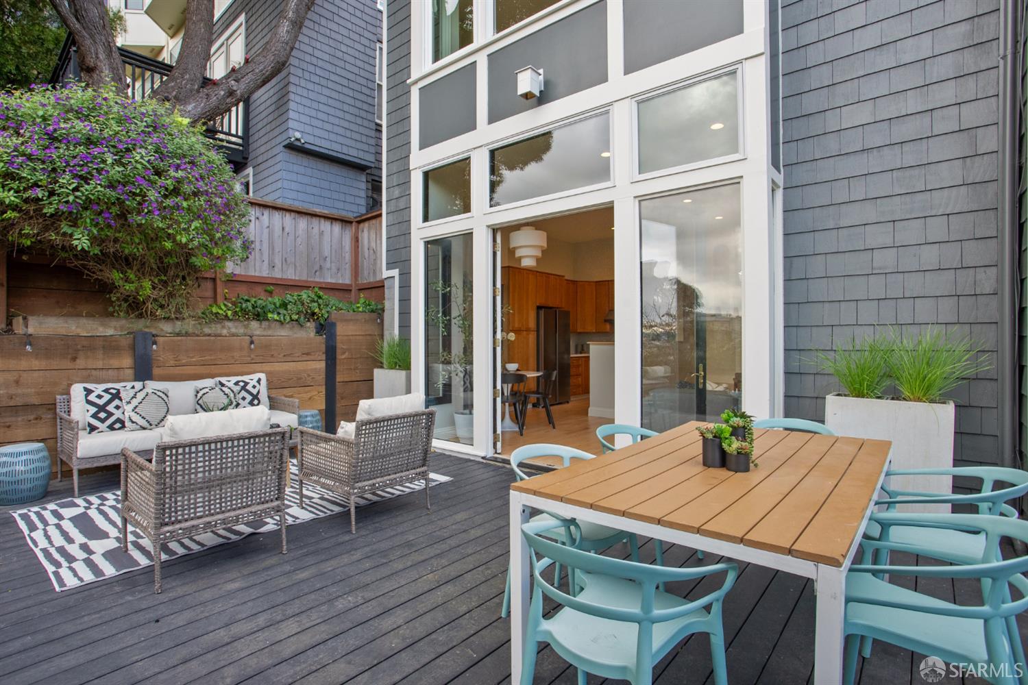 251 Ripley Street San Francisco, CA 94110 - Photo 34 of 39 a view of a patio with table and chairs