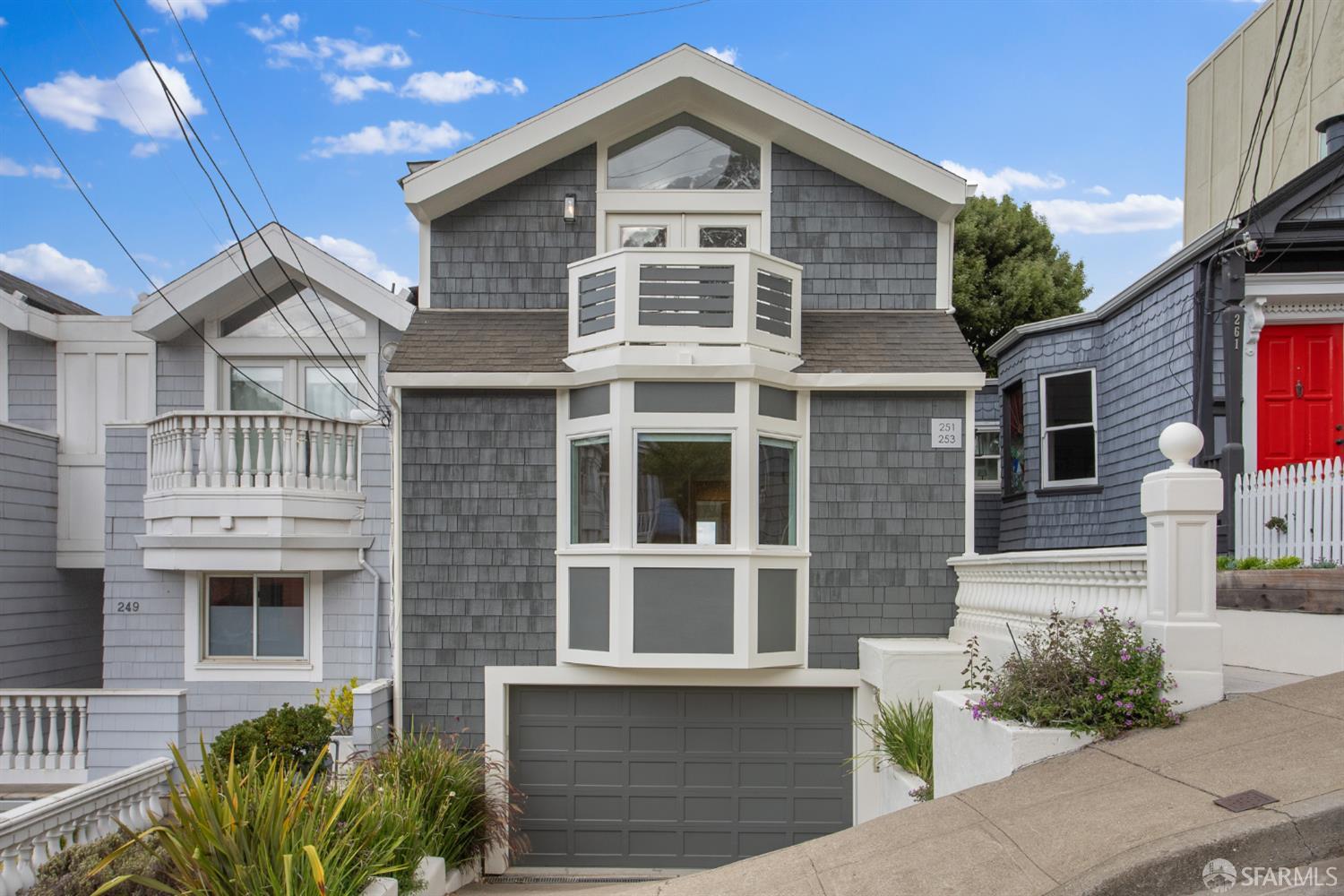 251 Ripley Street San Francisco, CA 94110 - Photo 37 of 39 a front view of a house with a yard