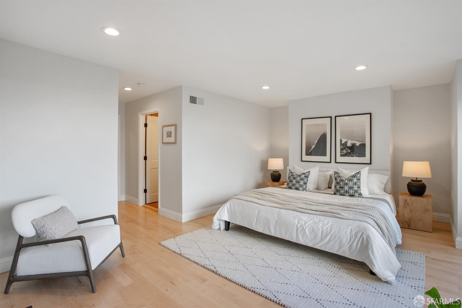 251 Ripley Street San Francisco, CA 94110 - Photo 6 of 39 a bedroom with a bed and chair