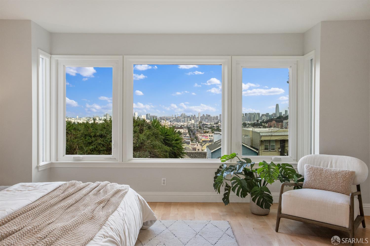251 Ripley Street San Francisco, CA 94110 - Photo 7 of 39 a bedroom with furniture and a large window