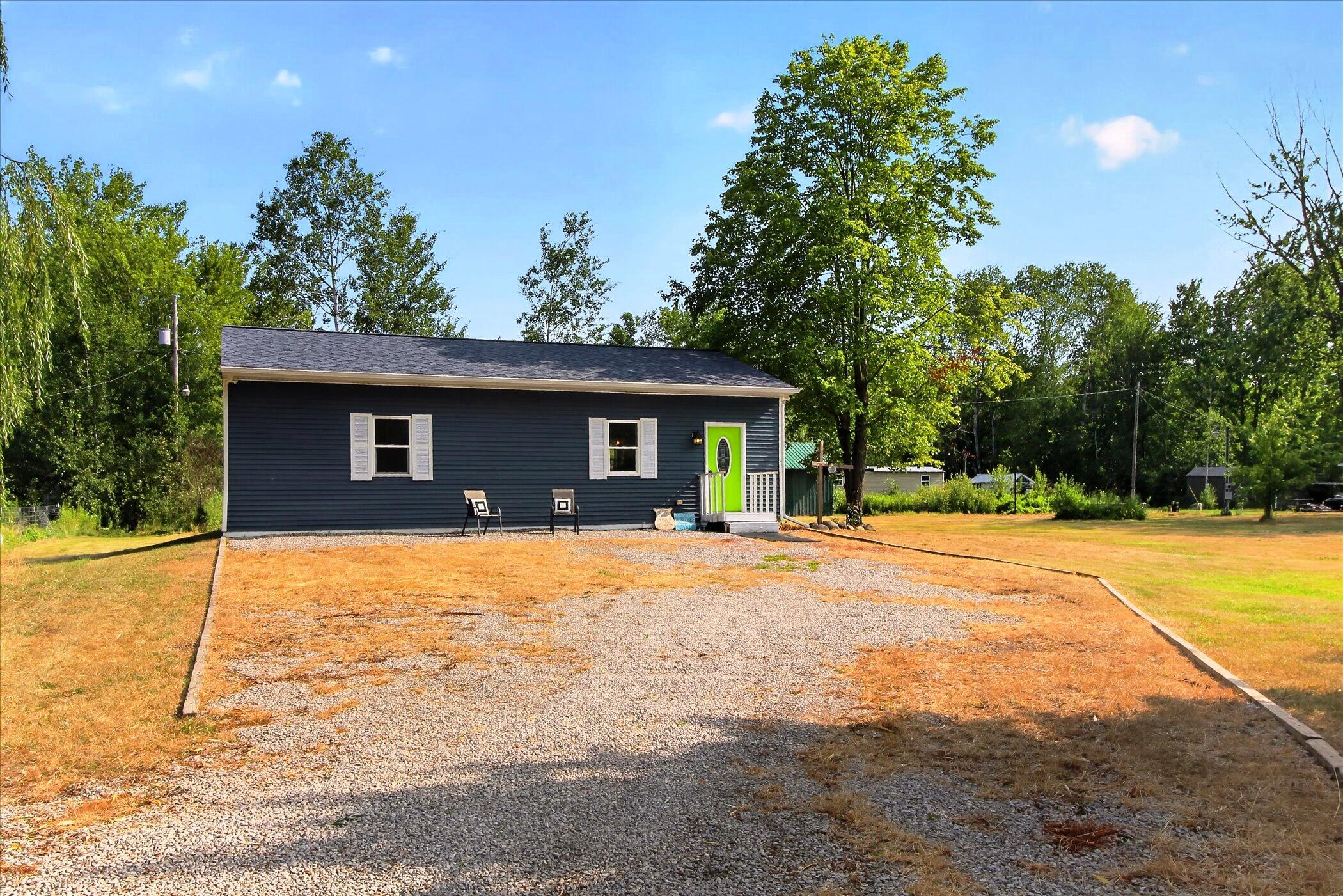 8048 17 Mile Road Rodney, MI 49342 - Photo 2 of 53 02-8048-17-Mile-Rd-Rodney-WindowStill