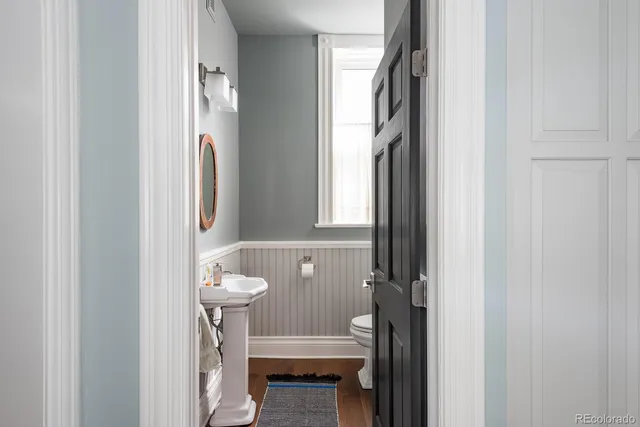 a bathroom with a sink and toilet