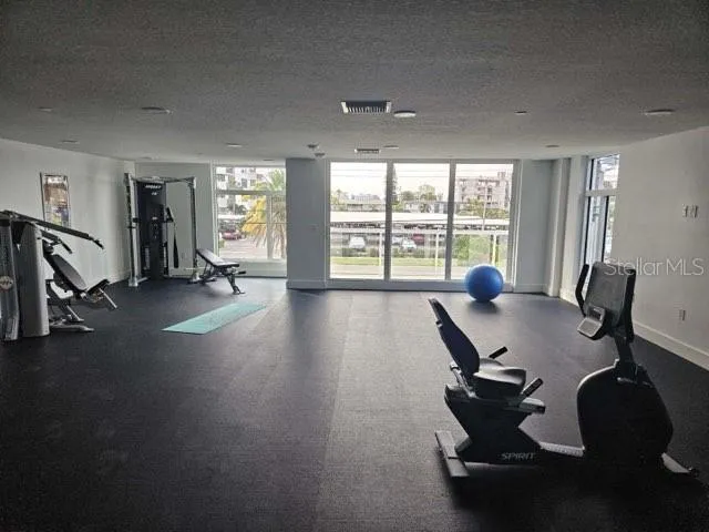 a view of a room with gym equipment