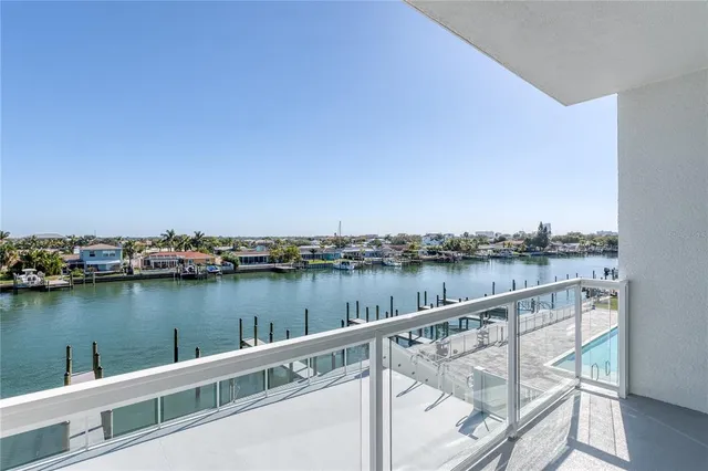 a view of a lake from a balcony